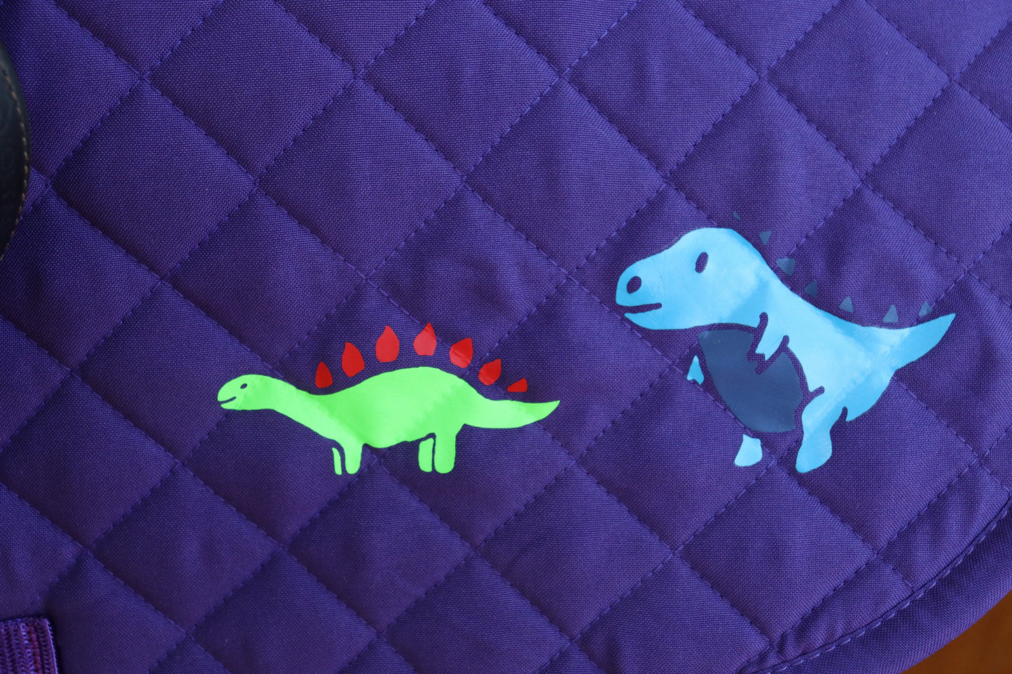 Saddle pad for horse or pony, Dinosaurs on purple saddle pad, Cute Saddle pad for horseback riders, Equestrian saddle pad, Kids saddle pad